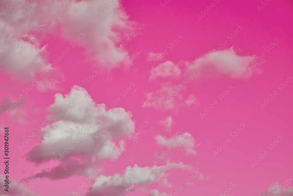 Pink sky with white clouds - beautiful romantic sunset, copy space