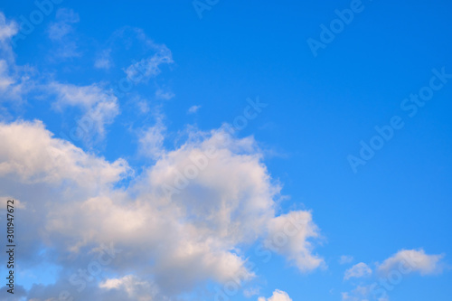 Blue sky with white clouds on a summer day  copy space