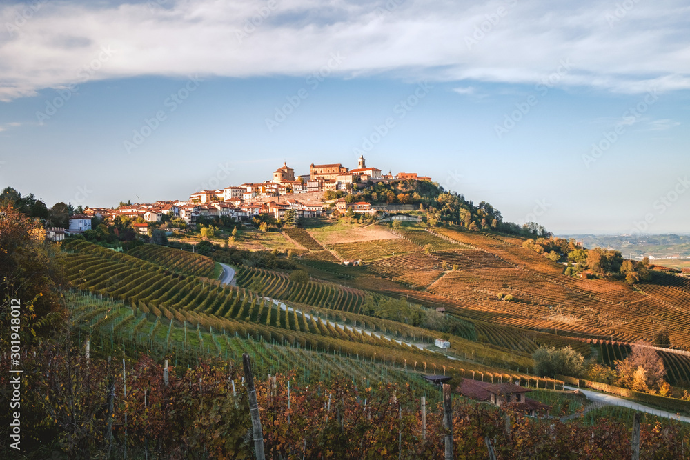 Fototapeta premium La Morra village, langhe vineyards hills. Viticulture of Dolcetto, Nebbiolo and Barbera red wine. Tourism in Europe, travel destination. Piedmont, Italy landmark.