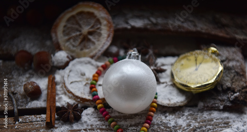 Christmas still life Christmas decorations balloon orange clock snow and powdered sugar