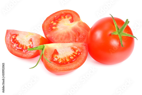 fresh tomatoes with slices isolated on white background.