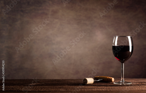 Red Wine in glass on a dark background with copy space
