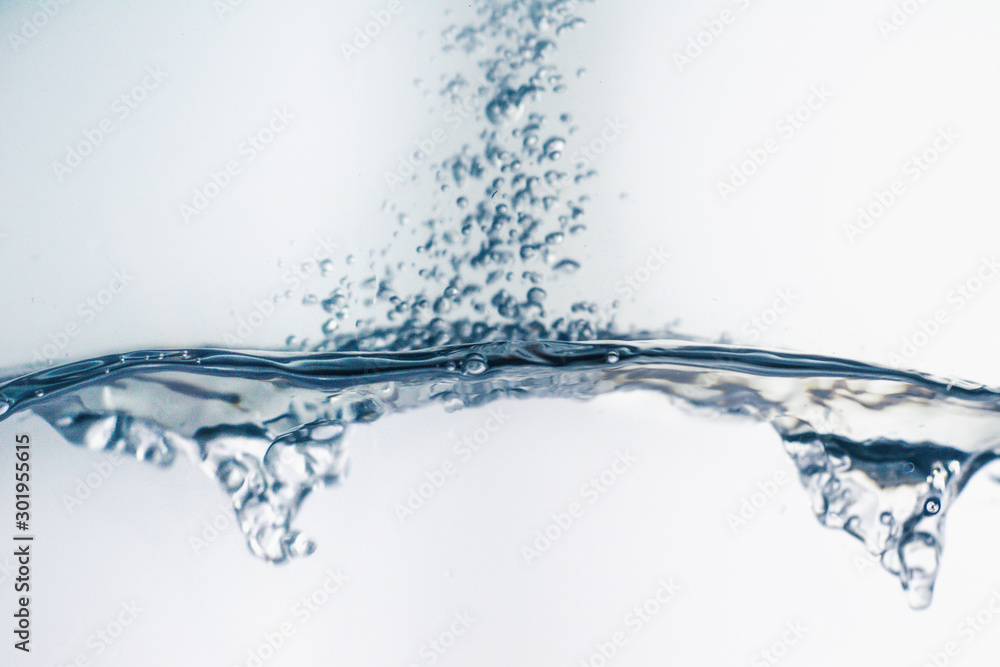 Water splash with bubbles of air, isolated on the white background. Water splash with bubbles of air, isolated on the white background.