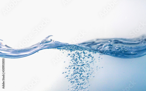 Water splash with bubbles of air, isolated on the white background.
