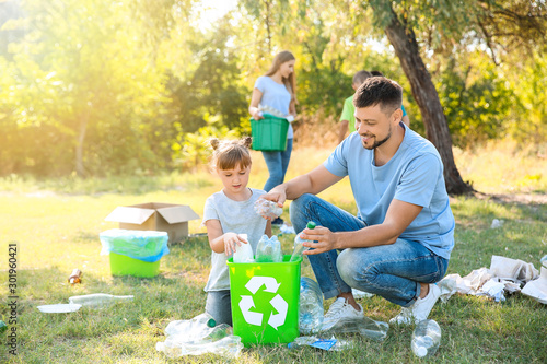 People gathering garbage ou...