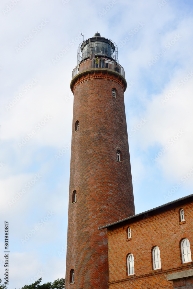 The historical lighthouse at the Darsser Ort, in Germany is made of red bricks