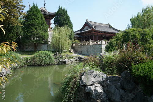 Suzhou,China-September 17, 2019: A pond and a garden in Nan Men, Suzhou, China