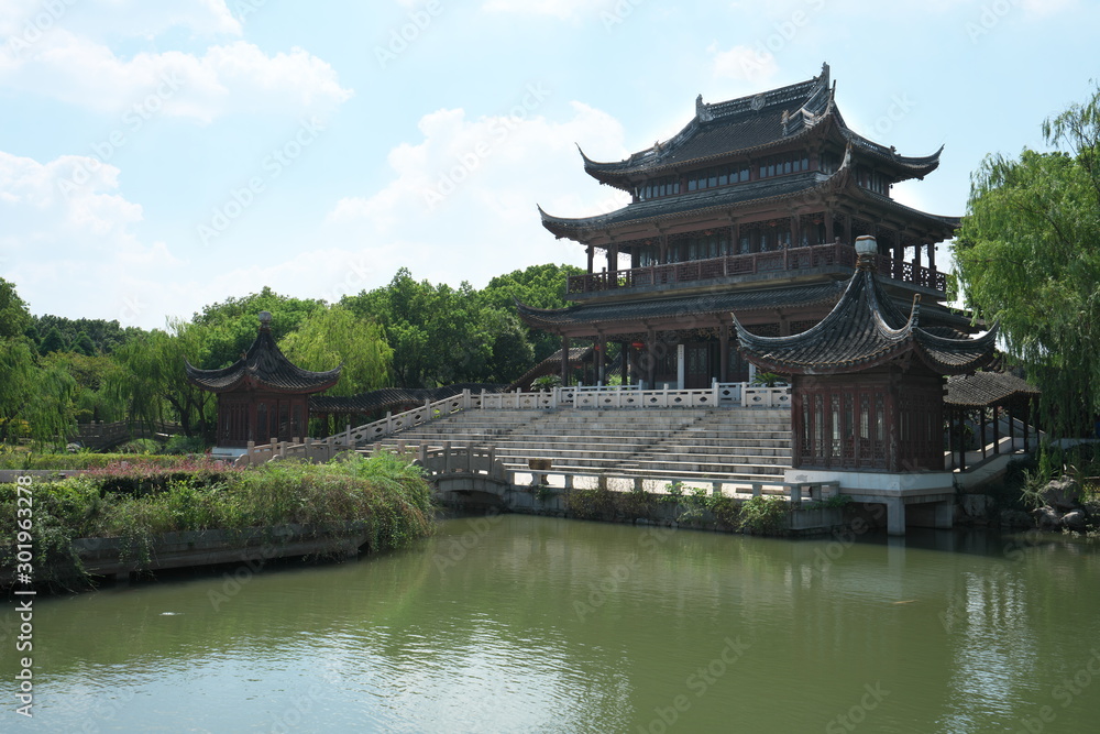 Suzhou,China-September 17, 2019: A pond and a garden in Nan Men, Suzhou, China