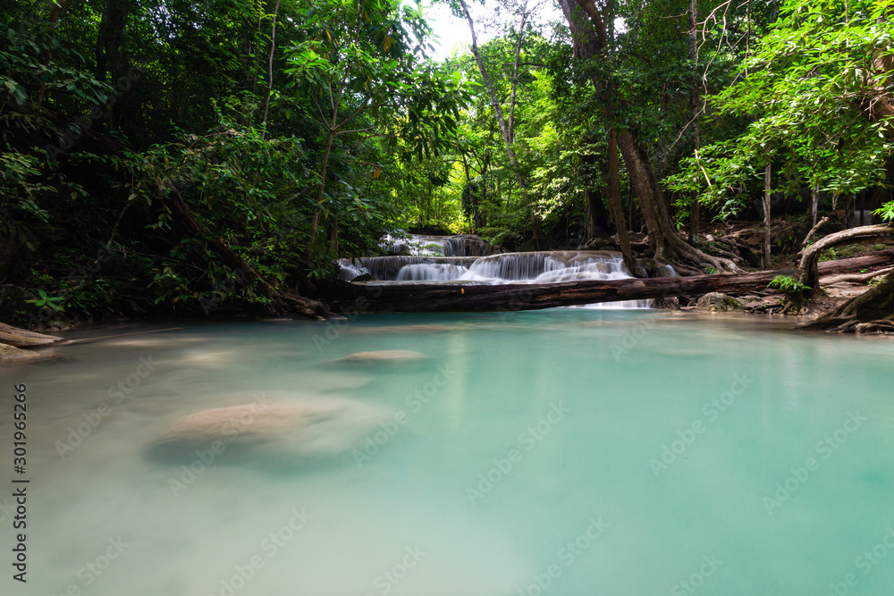 Naklejka premium Amazing beautiful Erawan waterfall in the rainforest park in Thailand,Erawan National Park