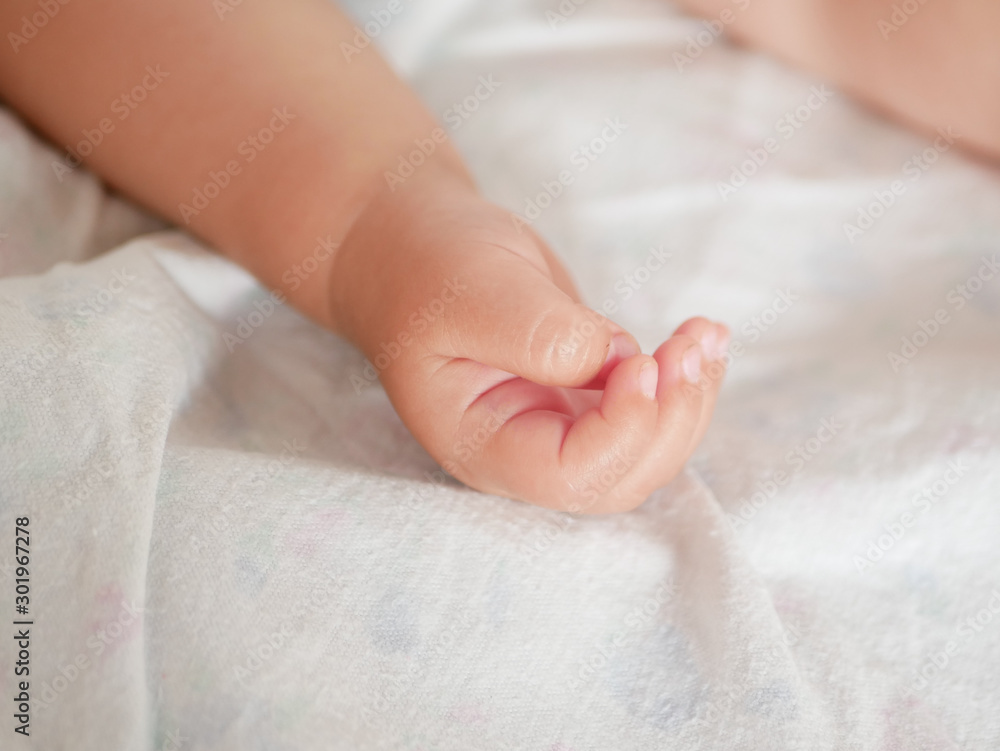 Babys hand. Close-up. A place to write. Placing text. defocusing. Babys hand. Close-up. A place to write. Placing text. defocusing.