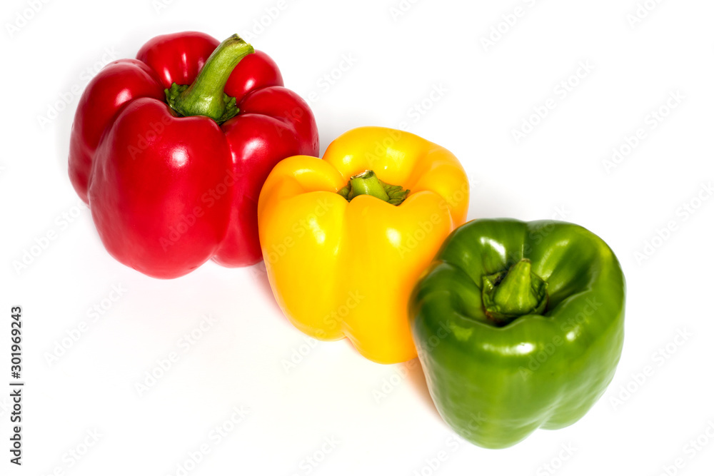 Three Red, Yellow, Green Peppers isolated on white background. Three Red, Yellow, Green Peppers isolated on white background.