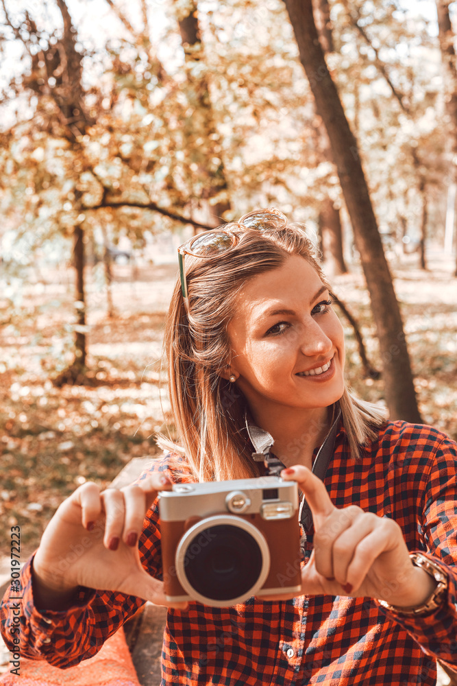Portrait of beautiful attractive woman enjoying and posing in autumn day. Portrait of beautiful attractive woman enjoying and posing in autumn day.