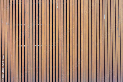 Foto pattern of modern wall with vertical wooden panel, slats