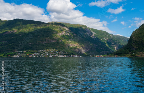 The village of Aurlandsvangen at the coast of the Sogne fjord Aurlands fjord at Norway. July 2019