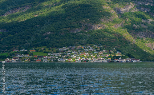 The village of Aurlandsvangen at the coast of the Sogne fjord Aurlands fjord at Norway. July 2019 © Сергій Вовк