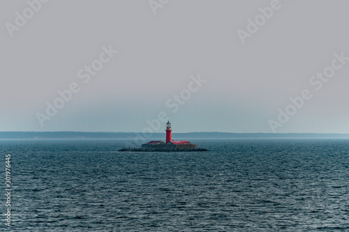 Kolka lighthouse at north coast of Latvia. photo