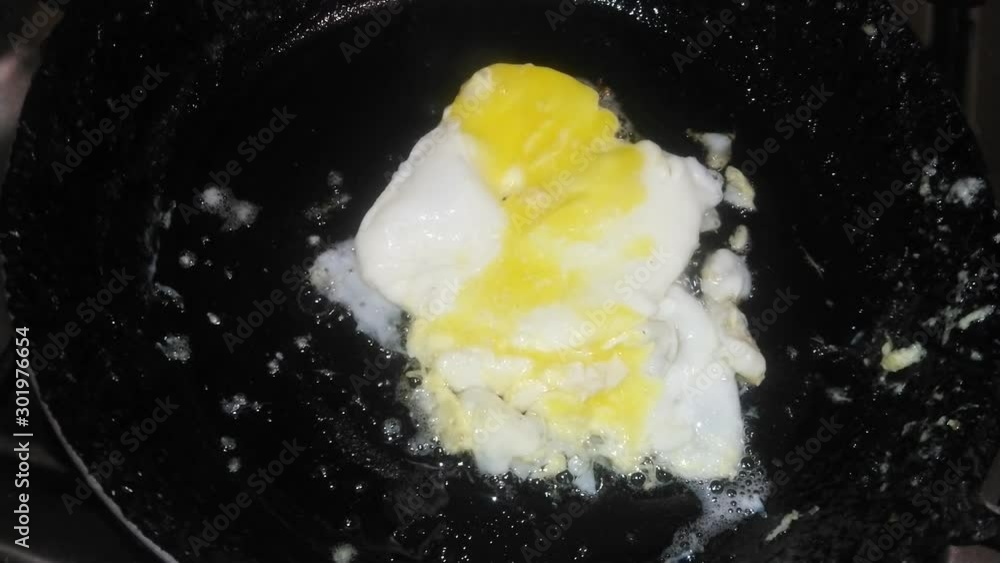 fried eggs are cooked in a frying pan fried eggs are cooked in a frying pan