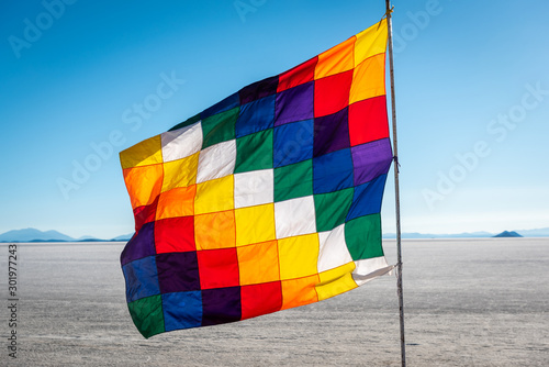 The colourful patchwork Wiphala represents the native people from parts of the Andes that travels through Bolivia, Peru, Ecuador, Argentina and Chile with the central colour composed of the most squar