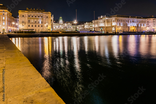 Skyline of Trieste. Atmospheric light at night. Italy