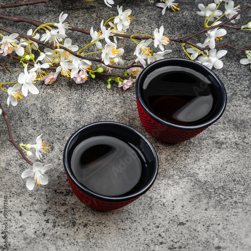 Japanece bowls (cups) with tea. Top view photo