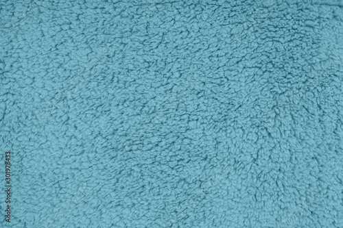 Blue sherpa textured plush fabric material background