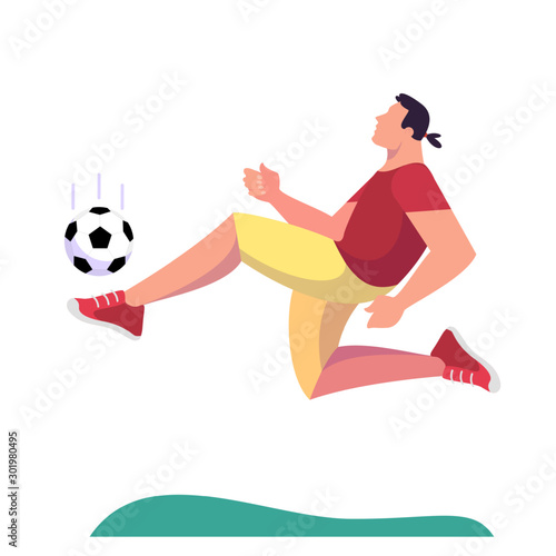 Athletic football kicking the ball