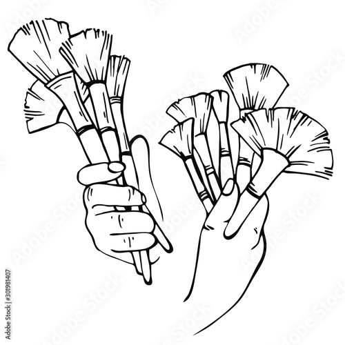 Sketch hands of makeup artist with brushes. Hand drawn make up brushes