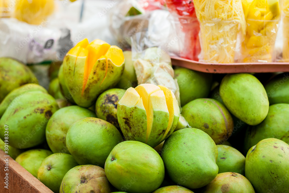 Traditional cart of an street vendor of tropical fruits in the city of Cali in Colombia Traditional cart of an street vendor of tropical fruits in the city of Cali in Colombia