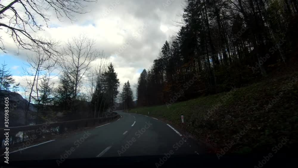 Point of view dashboard driving by lake Bohinj in Slovenia Point of view dashboard driving by lake Bohinj in Slovenia