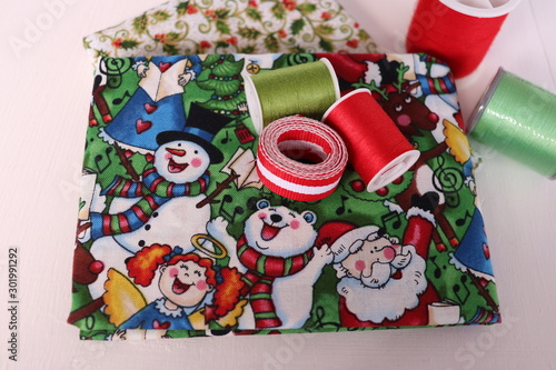 Threads, ribbons, fabric and paper to create home christmasproject handcraft photo