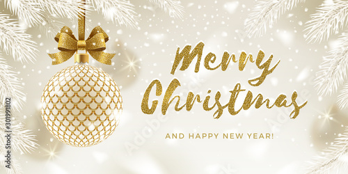 Christmas greeting card. Glitter gold brush calligraphy greeting and patterned golden bauble with bow hanging on a christmas tree. Vector illustration.