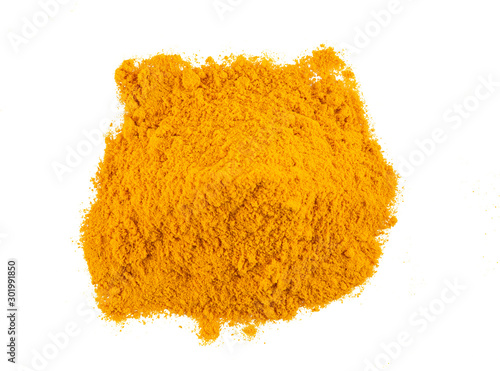 Some ground turmeric isolated on white background with copy space for text, images. Spices and herbs. Packaging concept. Close-up, top view.