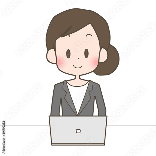 PCを操作する女性　スーツ