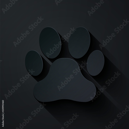 Paper cut Paw print icon isolated on black background. Dog or cat paw print. Animal track. Paper art style. Vector Illustration