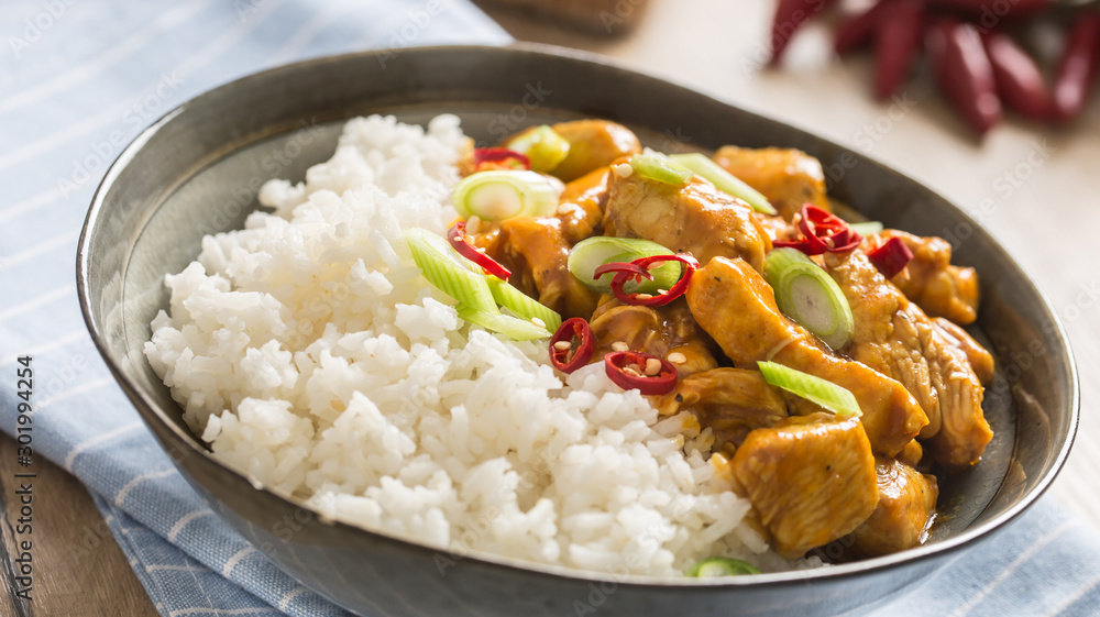 Chicken curry rice chili and young onion in bowl Chicken curry rice chili and young onion in bowl
