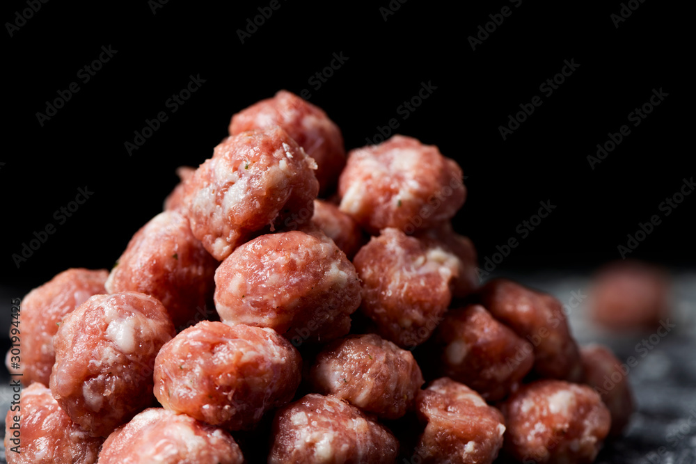 pile of raw meatballs pile of raw meatballs
