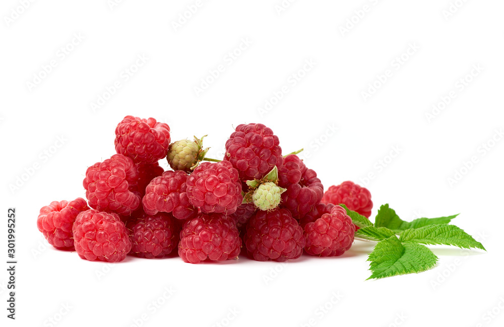 bunch of red ripe raspberries and green leaf on a white background bunch of red ripe raspberries and green leaf on a white background