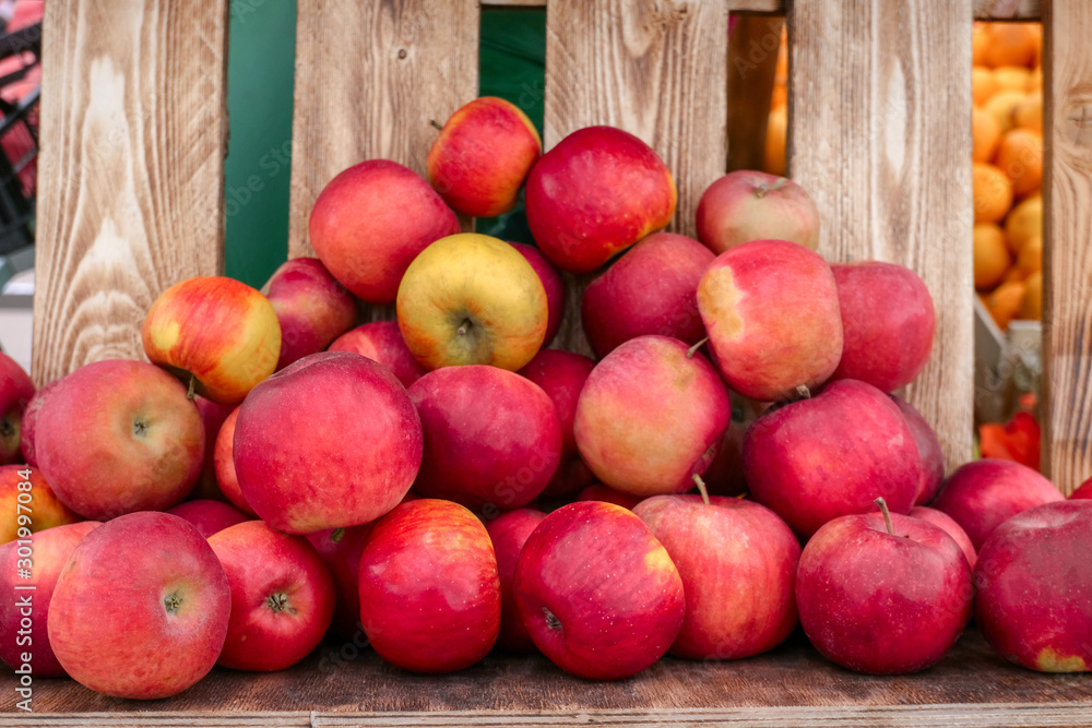 fresh ripe organic apples on a wooden background on a street farm market fresh ripe organic apples on a wooden background on a street farm market