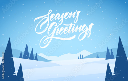 Blue mountains winter snowy landscape with pines and hand lettering of Season's Greetings. Christmas card.