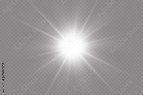 White glowing light explodes on a transparent background. with ray.  Transparent shining sun, bright flash.  Special lens flare light effect.