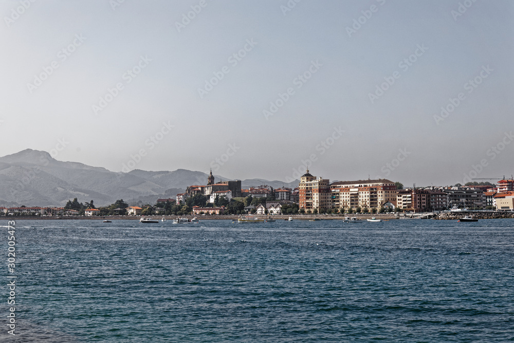 Fototapeta premium Fuentarrabia, Basque Country, Spain - View to the village from the french side of the Bidassoa river