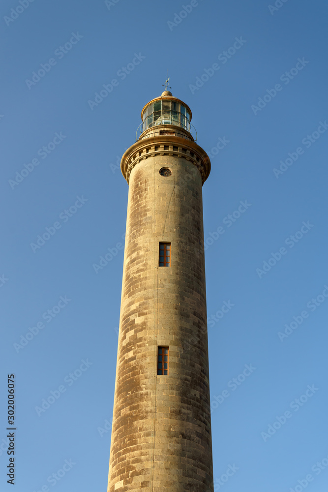 Maspalomas lighthouse and blue sky with clouds in background, Gran canaria, Canary islands, Spain