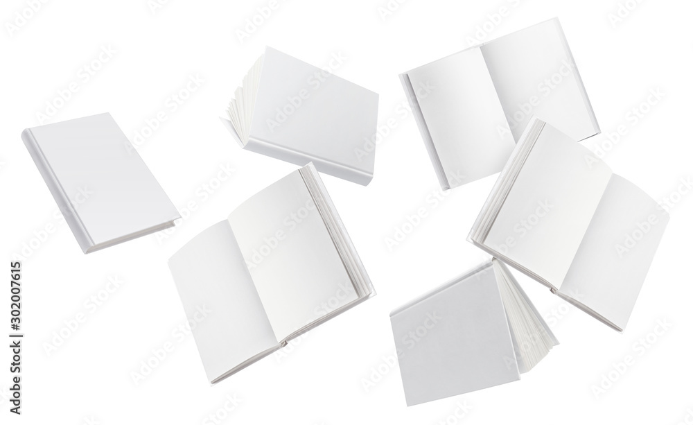 Flying blank white hard cover books, isolated on white background