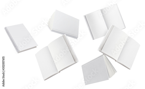 Wallpaper Mural Flying blank white hard cover books, isolated on white background Torontodigital.ca