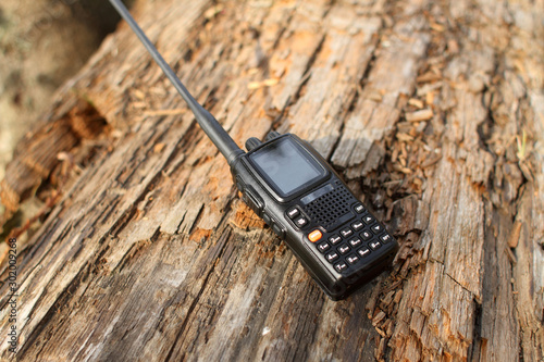 A modern dual band walkie talkie radio with keyboard. photo