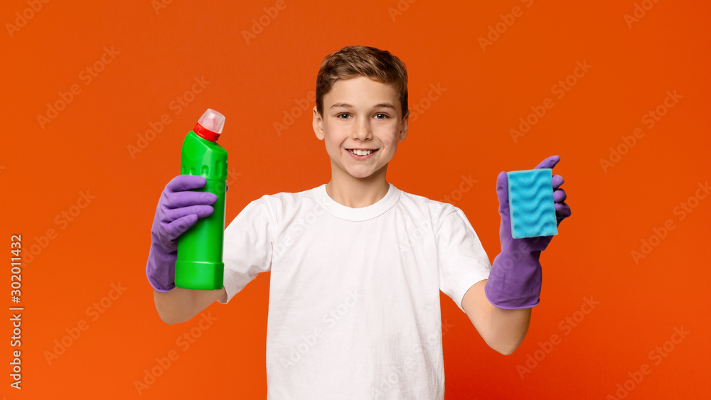 Teenager in protective gloves holding sponge and bottle with detergent Teenager in protective gloves holding sponge and bottle with detergent