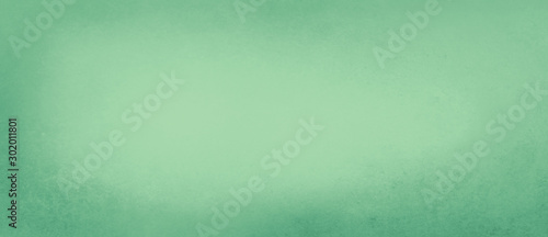 Pastel green background paper in texture border design of soft blank solid blue green background with light center and dark borders, elegant Easter spring color with faint distressed vintage texture