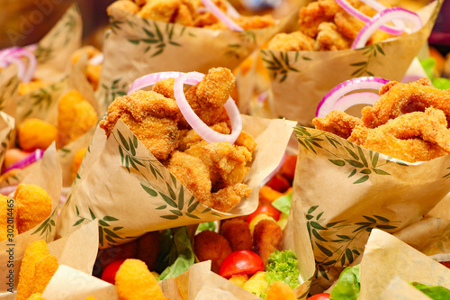 assortment of fried and battered seafoods for sale at Barcelona food market