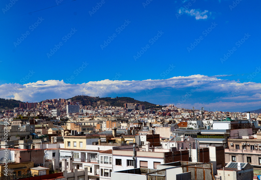 Barcelona skyline with blue sky