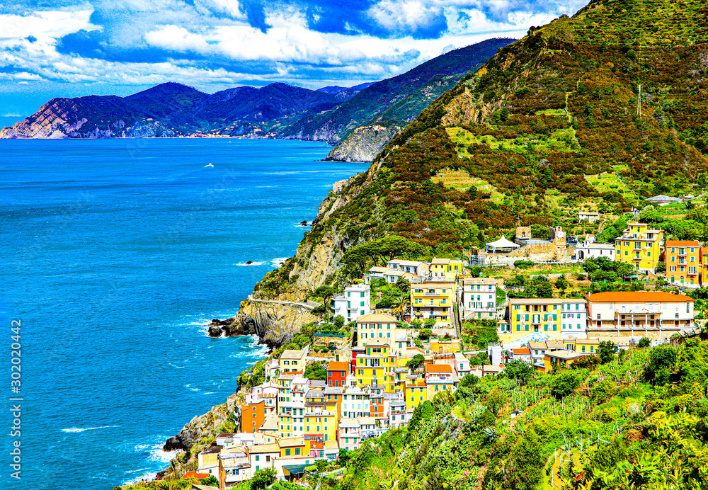 coastal view of Cinque Terre, the Riomaggiore village which is a small village in the Liguria region of Italy.